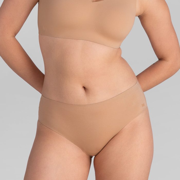 SoftFormMidRiseBrief-Model-Sand-M-Elle-Front.jpg